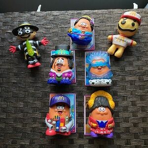 A mixed lot of McDonald's Adult Happy Meal toys. Kerwin Frost/ Cactus Plant